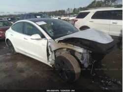 TESLA MODEL 3 5YJ3E1EA1JF153267